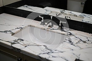 Bathroom vanity sink with white quartz countertop