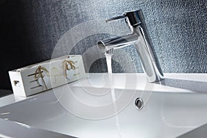 Bathroom water mixer. Water tap made of chrome material