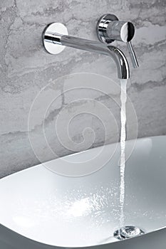 Bathroom water mixer. Water tap made of chrome material