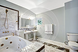 Bathroom with whirlpool bath tub
