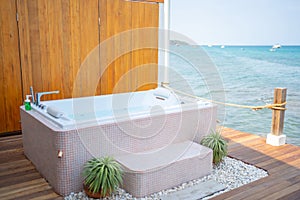 A bathtub with a background with sea views in Thailand