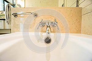 Bathtub faucet in the bathroom