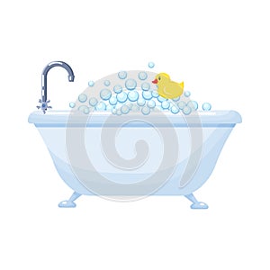 Bathtub full of soap foam bubbles with  yellow  rubber  duck