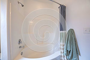 Bathtub and shower kit with wall mounted shower head and faucet