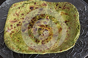 Bathua paratha on plate