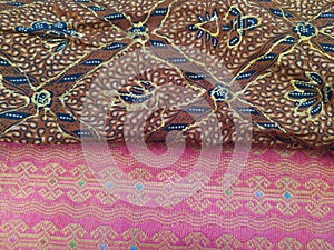 Batik and Songket are the traditional herritage of Indonesia. It is traditional clothes and used usually when there is ceremony.