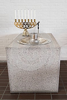 Batismal font and candleholder in church of Qarqrtoq, Greenland