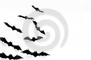 Bats cutout on Halloween frame on white table top view copy space