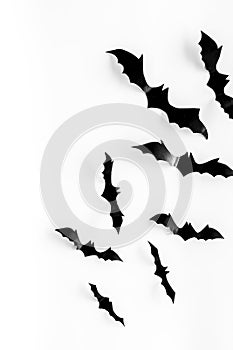 Bats cutout on Halloween frame on white table top view copy space