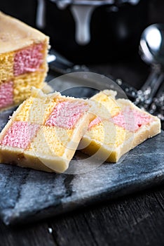 Battenberg cake on serving board