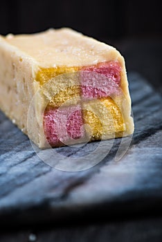 Battenberg cake on serving board