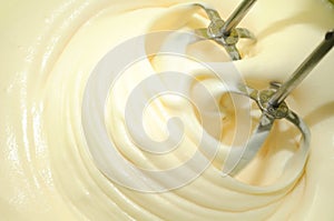 Batter Being Whipped with Mixer photo