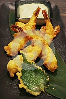Batter fried tempura shrimps with wasabi mayonnaise and soya sauce, japaneese food speciality