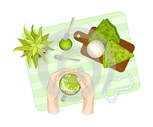 Battercake on Wooden Board and Human Hands Holding Cup with Green Matcha Tea Vector Illustration