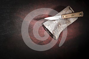 Battered Ax Head and Kitchen Knife