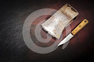 Battered Ax Head and Kitchen Knife