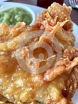 Battered Fish and mushy peas