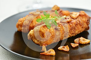 Battered and fried cod fillets