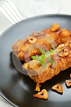 Battered and fried cod fillets