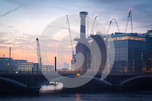 Battersea Power Station and Battersea Railway Bridge at sunrise