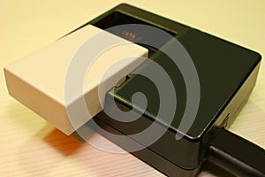 Battery for the camera close-up on a light background