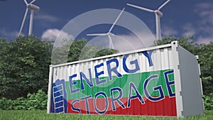 Battery container with flag of Bulgaria and ENERGY STORAGE text at wind turbines. Ecological electric power concept. 3d