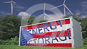 Battery container with flag of Puerto Rico and ENERGY STORAGE text at wind turbines. Ecological electric power concept