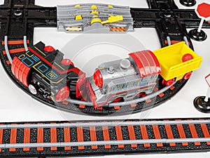 Battery-powered locomotives, toy children`s railway with rails, train collision, game, selective