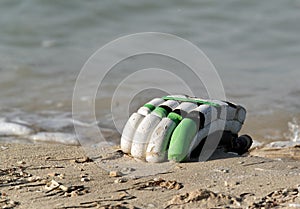 Batting glove lying in Busaiteen coast