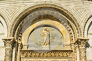 Battistero di San Giovanni with decorated dome, the square of Miracles in Pisa, Italy