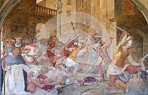 Battle between Catholics and heretics at the time of St. Peter the Martyr, fresco in Santa Maria Novella church in Florence photo