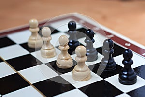 Battle of pawns on the chessboard