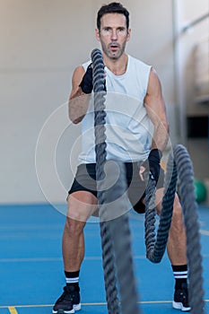 Battle rope exercise in the gym