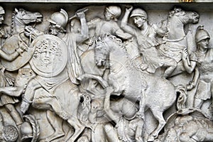 Battle scene below River god (Arno) statue