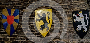 battle shield against a wall in the Gravensteen castle in Ghent, Belgium