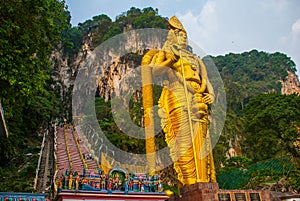 Batu Caves, gold statue Lord Murugan. Kuala Lumpur, Malaysia.