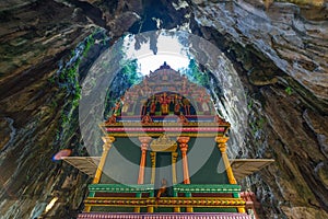 Batu Caves Kuala Lumpur Malaysia, scenic interior limestone cavern decorated with temples and Hindu shrines, travel destination in