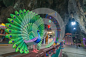 Batu Caves Kuala Lumpur Malaysia, scenic interior limestone cavern decorated with temples and Hindu shrines, travel destination in