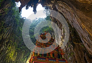 Batu Caves Kuala Lumpur Malaysia, scenic interior limestone cavern decorated with temples and Hindu shrines, travel destination in