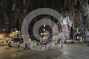 Tourists seen exploring and praying in the Hindu Temple, Batu Caves, Malaysia.