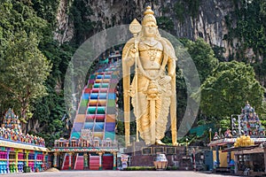 The Batu Caves Lord Murugan Statue and entrance near Kuala Lumpur Malaysia. A limestone outcrop located just north of Kuala Lumpur