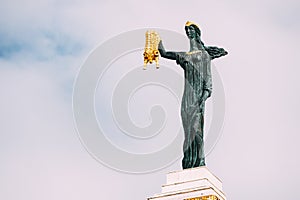 Batumi, Adjara, Georgia. Statue Of Medea On Sky Background In Europe Square. Woman Holding Golden Fleece. In Greek