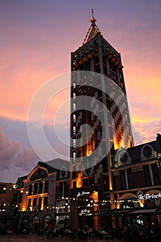 BATUMI, GEORGIA - MAY 31, 2022: Beautiful Piazza Boutique Hotel against colorful twilight sky