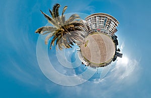 Batumi. Georgia. Palm tree. Blue sky. Mini planet Earth. Little planet earth with 360 viewing angel. Globe panorama of world