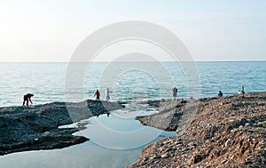 Batumi. Georgia - September 26, 2020:Fishermen on the Black Sea coast in Batumi