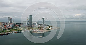 Batumi seaside beach, skyscrapers, city. Arial drone shot.