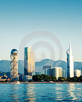 Batumi waterfront landmarks Alphabet tower, cha cha tower , real estate buildings of resort.Georgian vegas and black sea boat