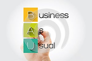 BAU - Business as Usual acronym with marker, business concept background