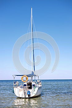 Bautiful motor boat along in the Black sea clear blue water near island in Skadovsk Region, Kherson Oblast near Crimea. Europe.