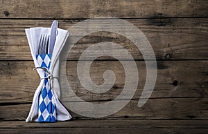 Bavarian food. Old wooden background with knife and fork. Table